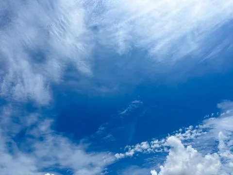 Captivating Daylight Sky with Soft Clouds: An Excellent Choice for Creative.. Stock Photos