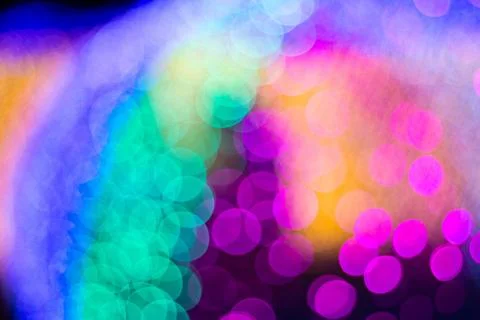 A captivating display of blurred lights in a rainbow palette, perfect for c.. Photos