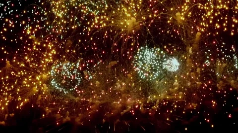 Captivating Display of Fireworks Illuminating Night Sky in Slow Motion Stock Footage 282435385