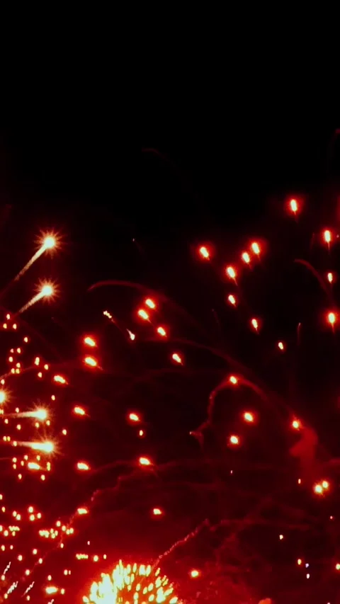 Captivating display of vibrant fireworks lighting up the night sky Video stock 327098211