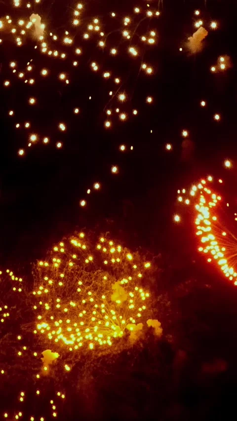 Captivating display of vibrant fireworks lighting up the night sky Stock-Footage 327294510
