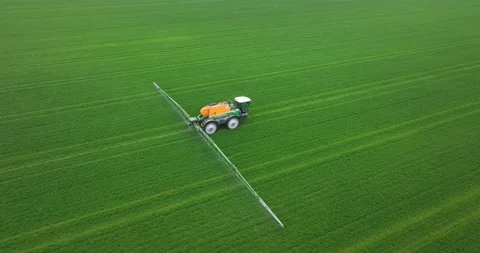 Captivating drone footage captures modern agriculture in action, as a tractor Vidéo 239768926