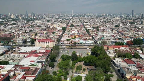 Captivating drone footage forward over Guadalajara cityscape Refugio Park 스톡 동영상 336266169