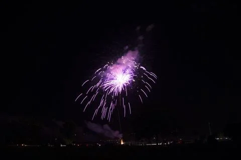 A captivating firework exploding in the night sky, featuring soft and ether.. Stock Photos