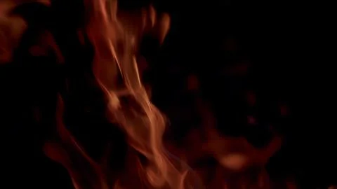 The Captivating Flames Dance Gracefully Against a Dark Background, Creating Ench Stock Photos