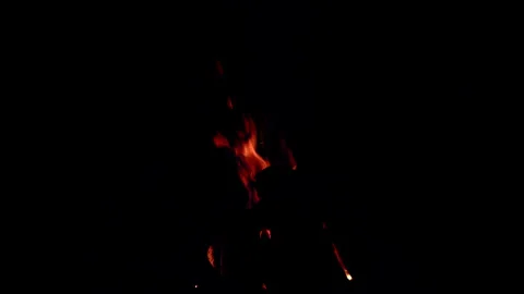 Captivating Flames in the Night Sky A Stunning Bonfire Display for Unforgettable Stock Footage 310570521