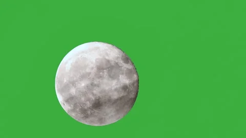 Captivating full moon rise through drifting clouds on a dark night sky in Stock Footage 305430440