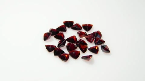 Captivating Glimmering Rubies on a Smooth White Background  .Keywords: gems.. Video stock 285454828