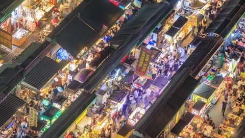 A captivating high-angle timelapse video overlooking a vibrant Taiwanese nigh Vidéo 327020917
