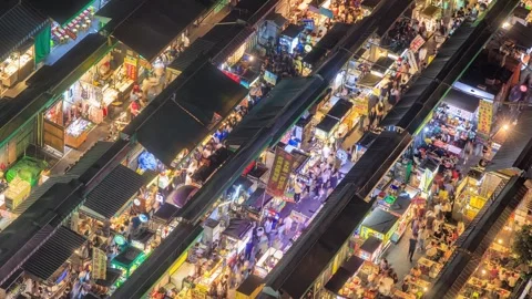 A captivating high-angle timelapse video overlooking a vibrant Taiwanese nigh Stockbeeldmateriaal 327020921