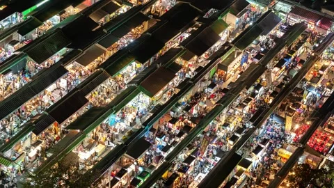 A captivating high-angle timelapse video overlooking a vibrant Taiwanese nigh Stock-Footage 327021048