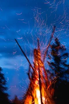 Captivating image of a massive conical bonfire during the Ivan Kupala celebra Stock Photos
