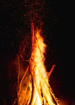 Captivating image of a massive conical bonfire during the Ivan Kupala celebra Stock Photos