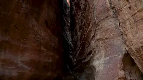 A captivating journey through the towering rock walls of The Siq,ancient Video stock 346642661
