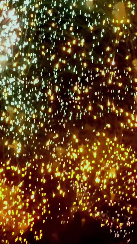 Captivating light display illuminating the night sky at a vibrant festival Stock Footage 299459706