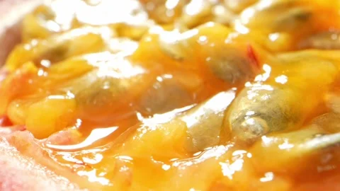 Captivating macro video of a half passion fruit Stock Footage 246594416