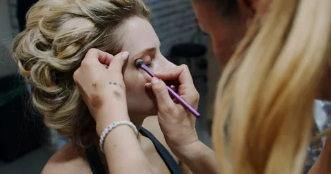 A Captivating Makeup Application Session Beautifully Captured in a Professional Stock Footage 318222579
