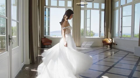 Captivating moments during bride's wedding photoshoot in elegant venue Stock Footage 321623502
