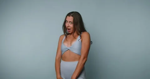 Captivating moments of self-expression and joy in a light blue outfit again.. Vidéo 329113322