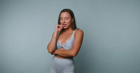 Captivating moments of self-expression with creative poses against a serene.. Stock-Footage 329113293