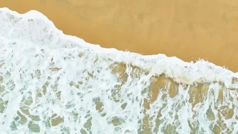 The captivating motion of sea waves crashes onto the shore. Stock Footage 308055371