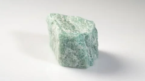 Captivating Natural Amazonite Gemstone Displaying Unique Texture and Color .. Stock Footage 294683891