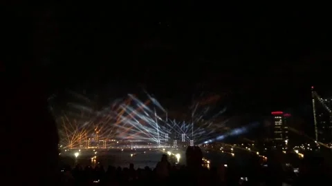 A captivating night fireworks display illuminates the sky with vibrant lights Stock Footage 312678671