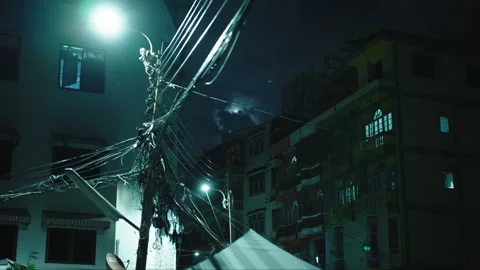 A captivating night scene featuring asian neighborhood urban architecture with a Stock Footage 303869740