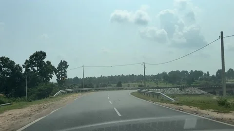 A captivating point-of-view (POV) shot looking down a rugged, beaten road Stock-Footage 347916600