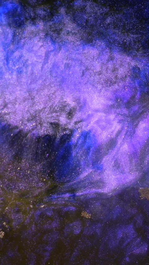 Captivating purple waves rolling ashore at twilight along a tranquil coastline Stock Footage 288245794