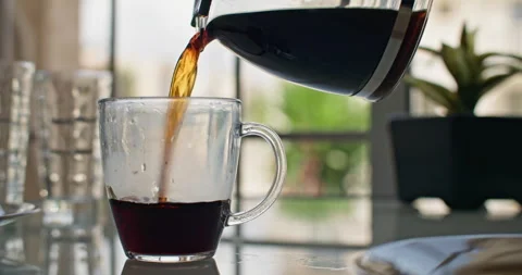 Captivating Scenes of Brewing Coffee into a Mug in the Morning Kitchen Stock Footage 245692058