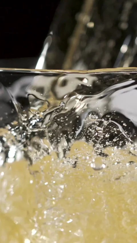 Captivating Slow Motion of Beer Pouring With Bubbles and Foam Stock Footage 340078972
