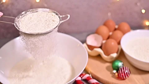 Captivating Slow-Motion Flour Sowing for Holiday Baking Stock Footage 255331994