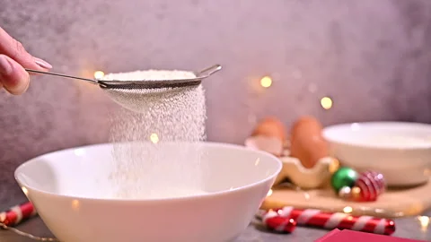 Captivating Slow-Motion Flour Sowing for Holiday Baking Stock Footage 255340615