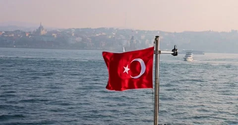 Captivating slow motion view of the Turkish flag on a ship Stock Footage 299816568