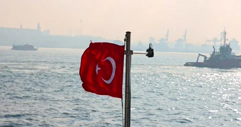 Captivating slow motion view of the Turkish flag on a ship in Istanbul Stock Footage 299817844