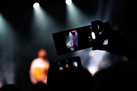 Captivating Stage Performance with Ambient Lighting Stock Photos