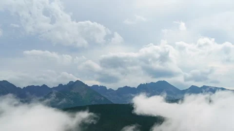 Captivating Tatra Summit Timelapse - Dense Fog  Partly Cloudy Sky Stock Footage 308193009