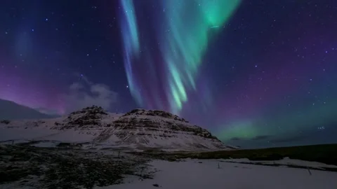 Captivating Time-Lapse of Aurora Borealis and Starry Night Sky. Embark on an Stock Footage 334659205