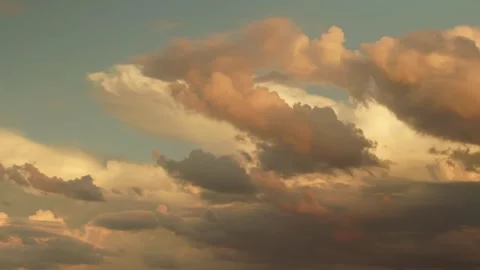 Captivating time-lapse footage of clouds at dusk Video stock 248461036