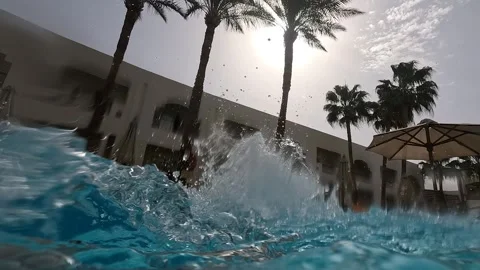 Captivating Underwater and Poolside Moments: A Journey Through Clear Waters and Видео 330099152
