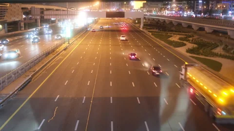 Captivating video shows a bustling highway at night with vibrant lights Stock Footage 308643437