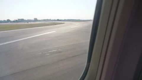 Captivating View from the Airplane Window During Take off in 4k slow motion.. Stock Footage 260233614