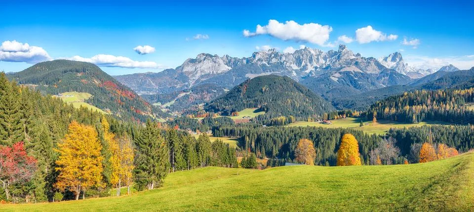 Captivating view of  Alpine green fields and mountains near St. Martin am T.. Stock Photos