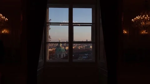 A captivating view of the cityscape seen through a grand window, framed by luxur Stock Footage 294772005