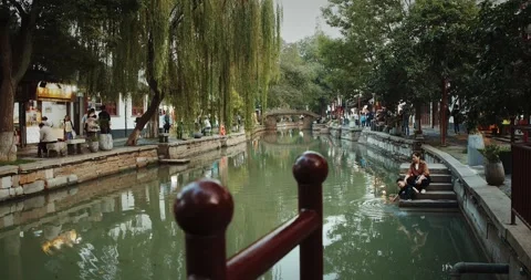 Captivating View Down the Waterway with Charming Architectural Elements. Stock Footage 314860971