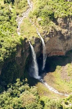 Capture the breathtaking aerial shot of Manto de la Novia waterfall in Stock Photos