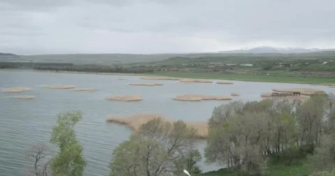 Capture the breathtaking panorama from a great height, overlooking Lake Sevan Stock Footage 252467552