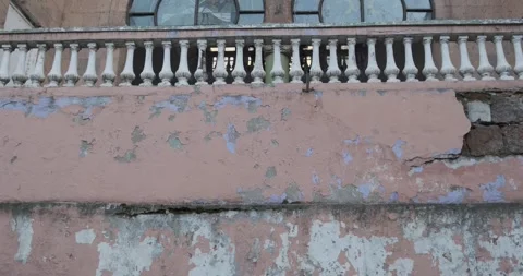 Capture the essence of a weathered and aged railway station building, evoking a Video stock 252467893