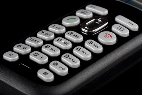 Capture the intricate details of alphanumeric keys on a telephone keyboard in a Stock-Fotos